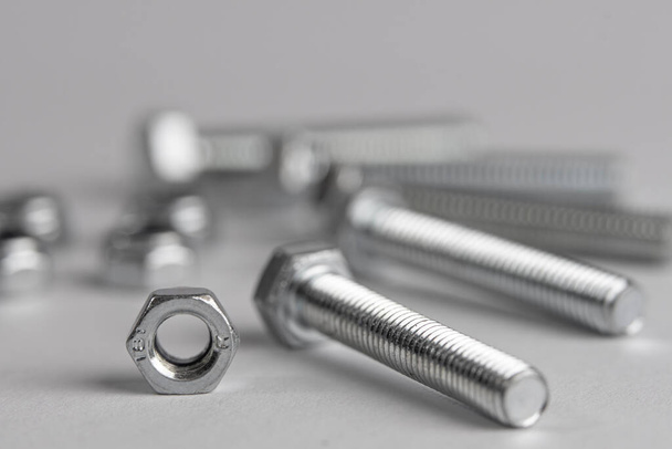 Screws, bolts mono chrome silver  macro photo . - Photo, Image