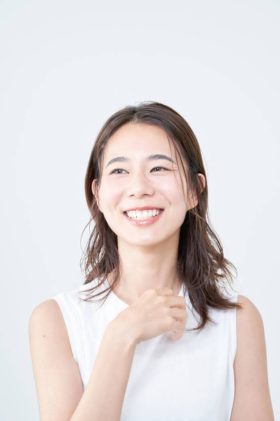 portrait of asian young woman and white background - Photo, Image