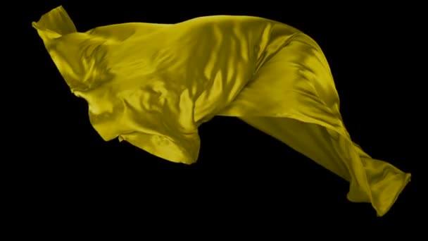 Żółte tkaniny płynące w powietrzu - Materiał filmowy, wideo