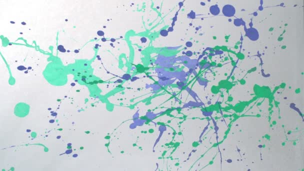 Dobott különböző színű festék - Felvétel, videó