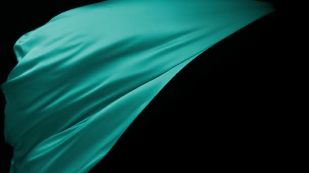 Zielony tkaniny płynące w powietrzu - Materiał filmowy, wideo