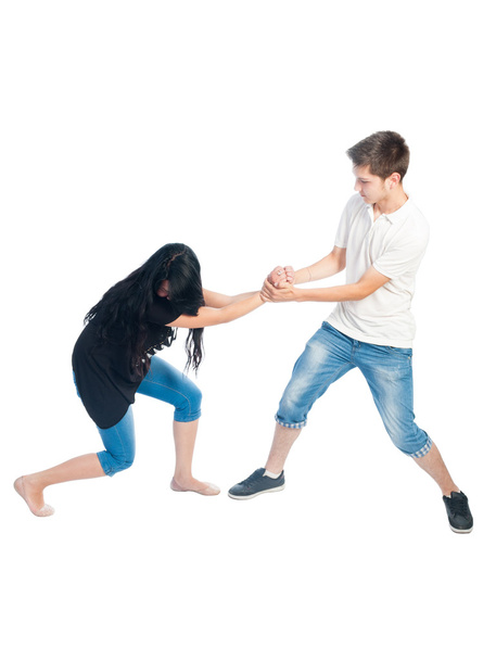 Boy grabbing hard a girl's wrist - Foto, imagen