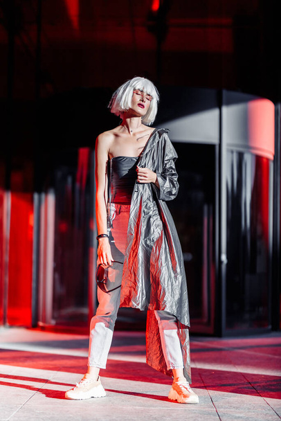 Futuristic style. Cyberpunk woman. High quality photo - Foto, afbeelding