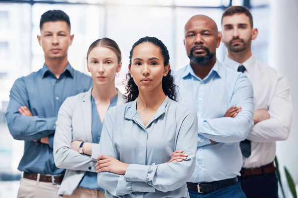 The number one business for you. a group of businesspeople standing with their arms crossed at work - Foto, Imagem