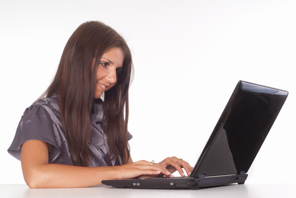 Woman with laptop - Фото, изображение