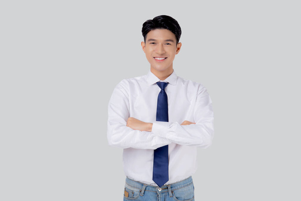 Portrait businessman with crossed his arms standing isolated on white background, young asian business man is manager or executive having confident is positive with success. - Photo, Image