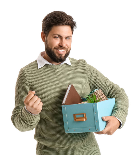 Fired young man holding box with personal stuff on white background - Φωτογραφία, εικόνα