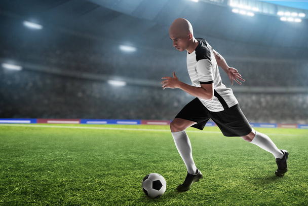 Professional soccer player in action - Foto, imagen