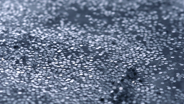 Aaltoja vedessä täynnä glitter
 - Materiaali, video