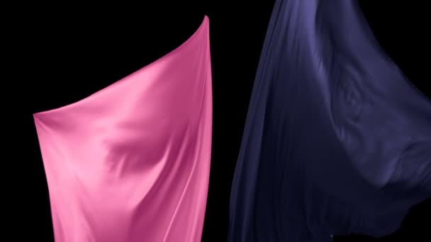 Blue and pink fabric flowing in the air - Footage, Video