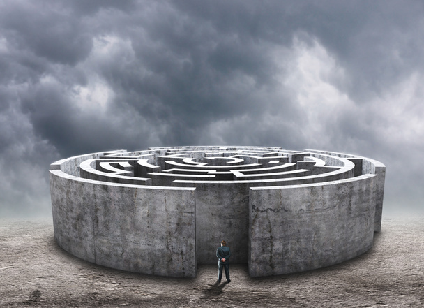 Man standing in front of the circular labyrinth - Photo, Image