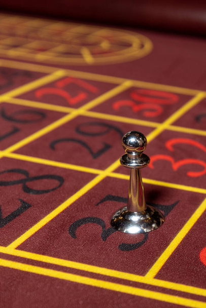 Roulette table with winning number Dolly close up at the Casino - Selective Focus. High quality photo - Fotoğraf, Görsel