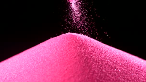 Hromadu růžové barevného písku - Záběry, video