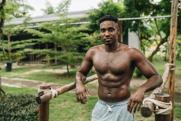 A portrait of sweaty African-american man after workout training. High quality photo - Фото, зображення