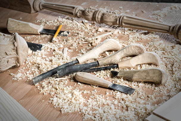 Carpenter's tools lying among sawdust - Foto, immagini