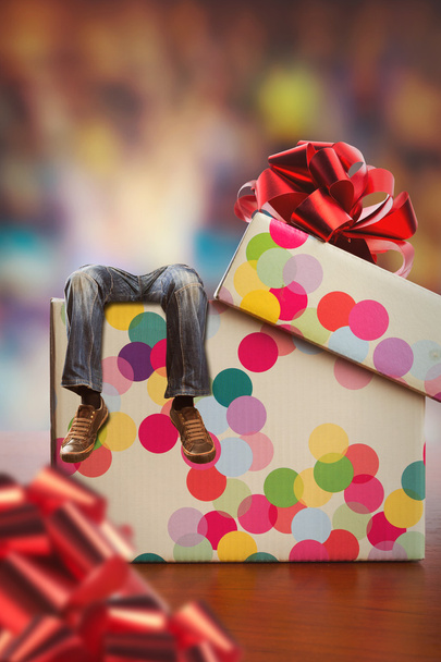 Adult man lies in present box - Photo, Image