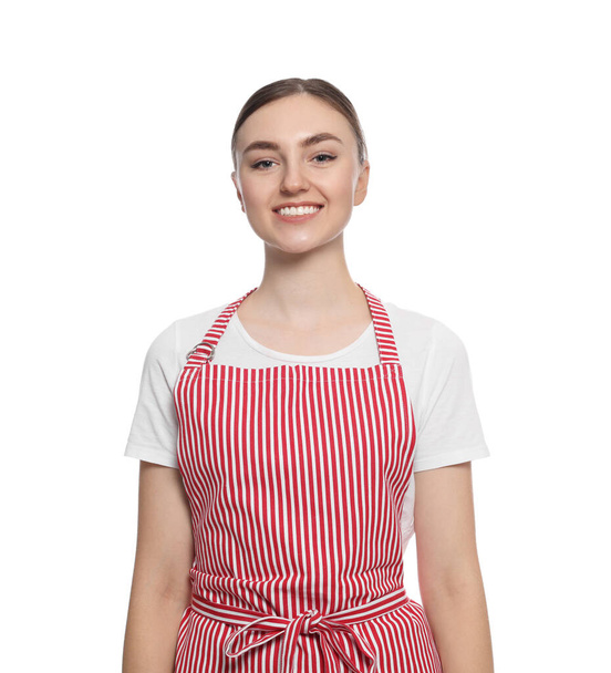 Beautiful young woman in clean striped apron on white background - 写真・画像