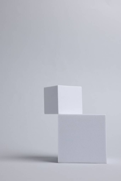 Scene with podium for product presentation. Cubes on light grey background - Fotoğraf, Görsel