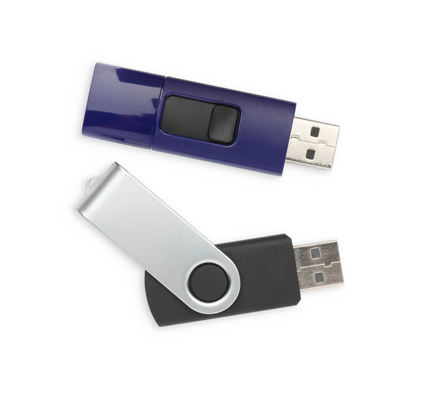 Modern usb flash drives on white background, top view - 写真・画像