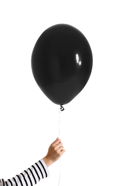 Woman with black balloon on white background - Фото, изображение