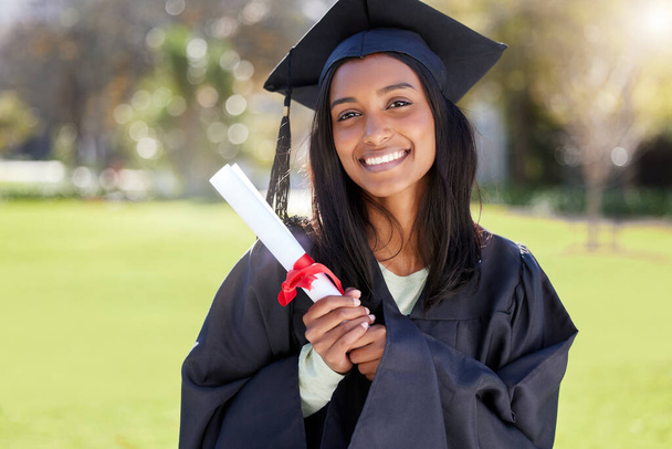 My ticket to success. Cropped portrait of an attractive young female student celebrating on graduation day - Foto, imagen