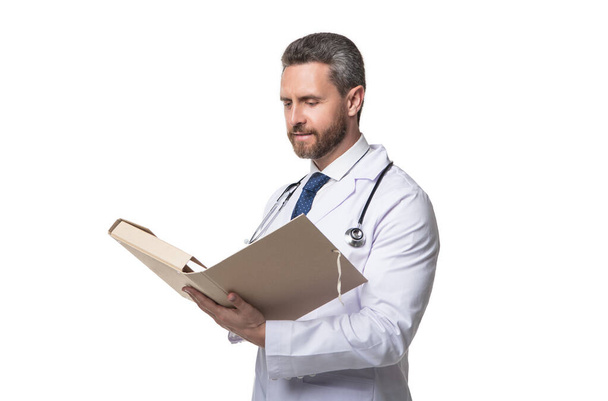 doctor with folder. doctor isolated on white. doctor read medical record. - Foto, immagini