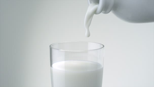 Pouring milk into glass - Footage, Video