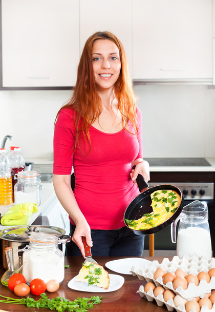 Woman  cooked omlet - Photo, image