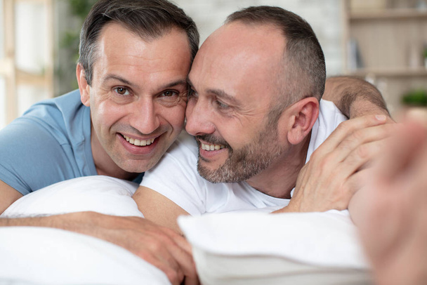 portrait of a cute male couple at home - Foto, afbeelding