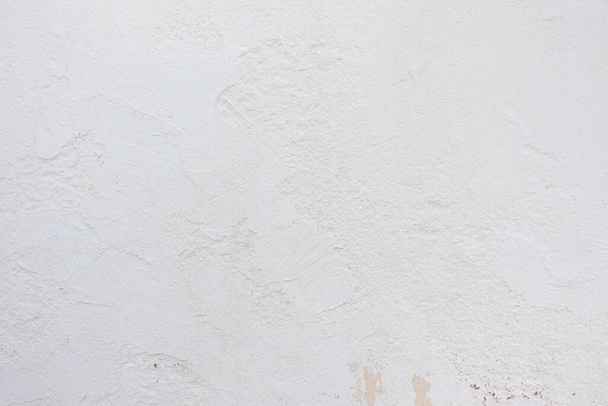 Fondo abstracto de textura de pared de estuco pintado en blanco grunge. Superficie antigua pared de hormigón blanco. - Foto, imagen