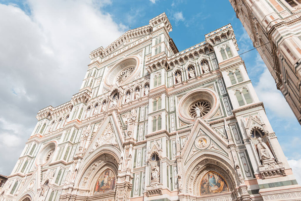 Amazingly beautiful Gothic architecture of the cathedral facade in the ancient European town of Florence, Italy - Fotoğraf, Görsel