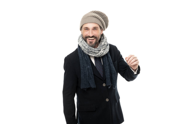 guy laugh in winter fashion with warm clothes. mature guy in winter warm clothes. guy wear winter warm clothes isolated on white background. studio shot of guy wearing warm clothes and hat. - Фото, зображення