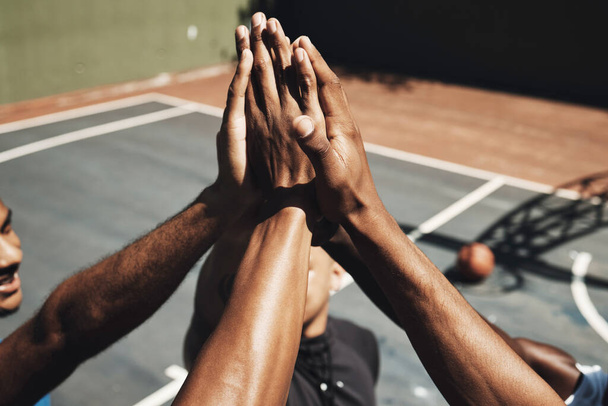 Sports friends, men or high five on basketball court in success game, community support workout or match motivation. Team building, winner or fitness celebration hands of players in exercise training. - Photo, Image