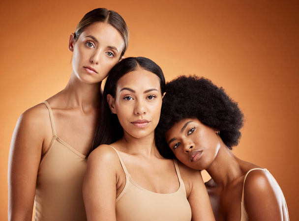 Beauty, diversity and skincare friends in studio, advertising natural, wellness and neutral product. Portrait, women and luxury model group bonding, grooming and hygiene routine for different people. - Foto, imagen