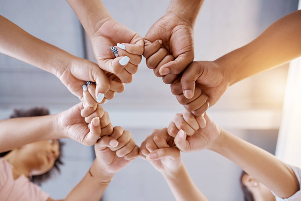 Fist bump, team building and business people in a meeting with mission, our vision and growth mindset in a circle. Below, huddle and hands of employees with group goals, targets and global support. - Foto, Imagem
