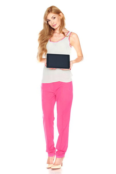 Girl in shirt and pants with tablet computer - Foto, Imagem