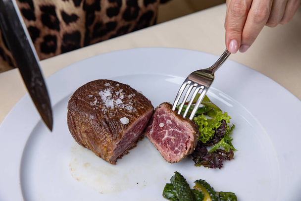 delicious steak from marbled meat in the restaurant - Foto, Imagen