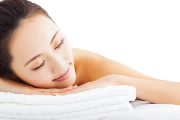 Young  woman getting spa treatment over white background - Photo, Image