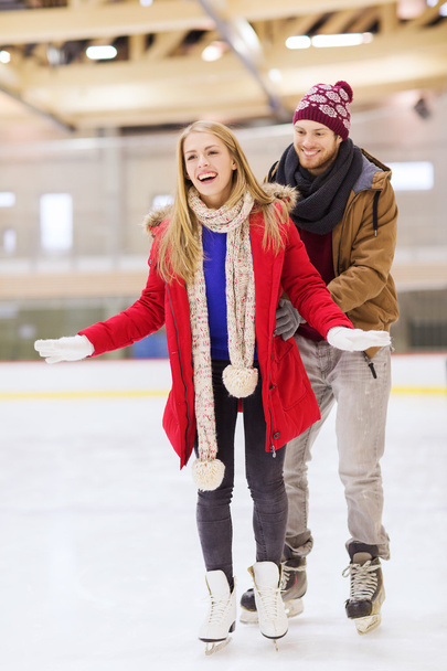 happy couple on skating rink - Фото, зображення