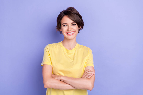 Portrait of positive pretty lady crossed arms beaming smile isolated on purple color background. - Фото, изображение