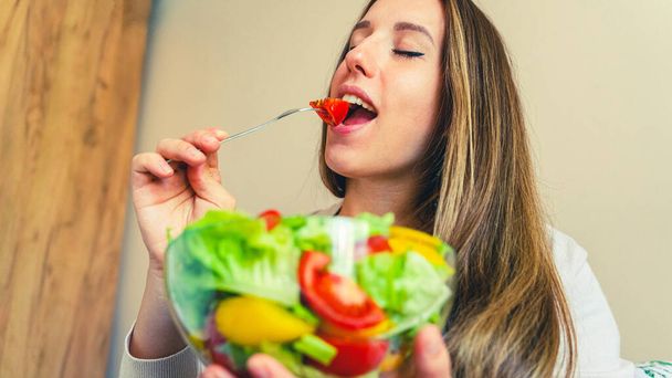 Pregnant healthy eating salad. Pregnancy woman eating nutrition healthy food. Healthy breakfast concept - Photo, Image