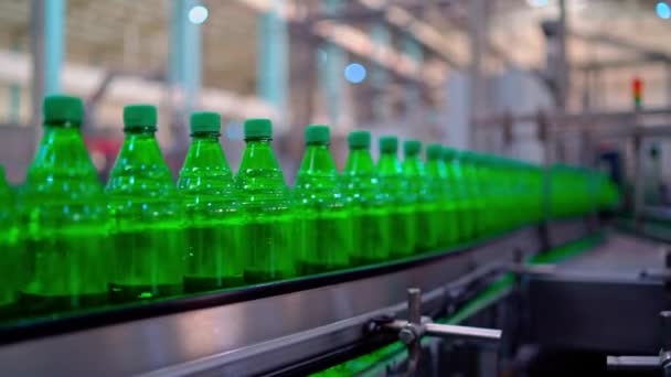 Row of bottle in conveyer at water factory. High quality 4k footage - Footage, Video