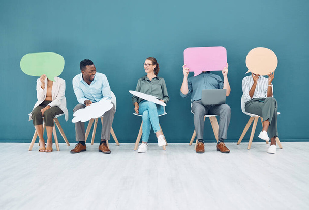 People with speech bubble, social media mockup space and sitting on chairs for digital marketing interview with hr. We are hiring advertising team, employee recruitment feedback and group talking. - Фото, зображення