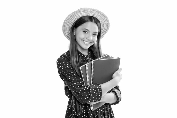 back to school. child in straw hat ready to study. childhood development. kid going to do homework. teenager student. high school education. schoolgirl with copybook. cheerful teen girl with notebook. - Photo, Image