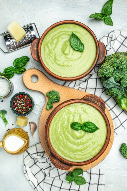 delicious broccoli soup with basil and cream, Diet detox food concept, vertical image. top view. place for text, - Photo, Image