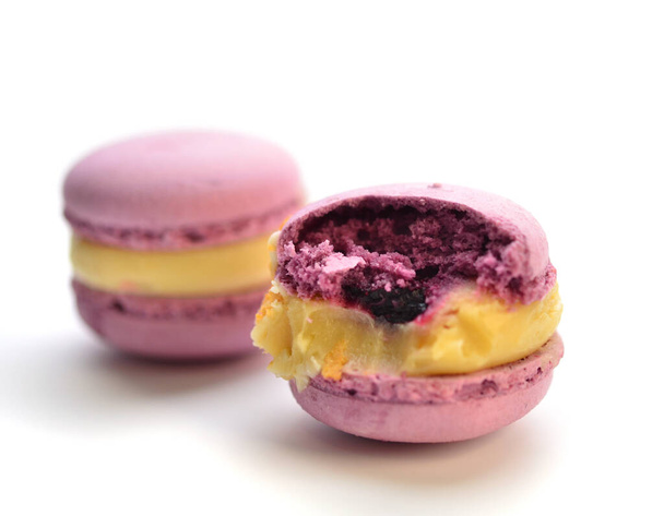 Delicious macaroons lie on a white tray. Dessert. Cakes. Treat. - 写真・画像