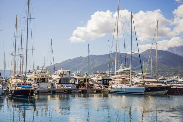 Yacht marina, beautiful Mediterranean landscape in warm colors. Montenegro, Kotor Bay, Tivat city. Porto Montenegro marina view. Go Everywhere. - Foto, Bild
