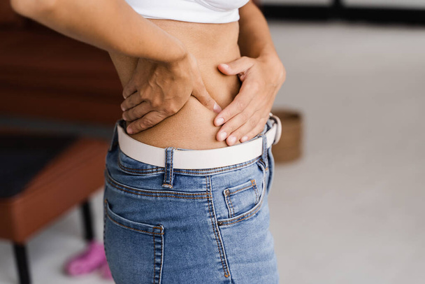 Kidney infection pyelonephritis urinary tract infection. African american woman feel backache spine pain because of UTI pyelonephritis disease - Zdjęcie, obraz
