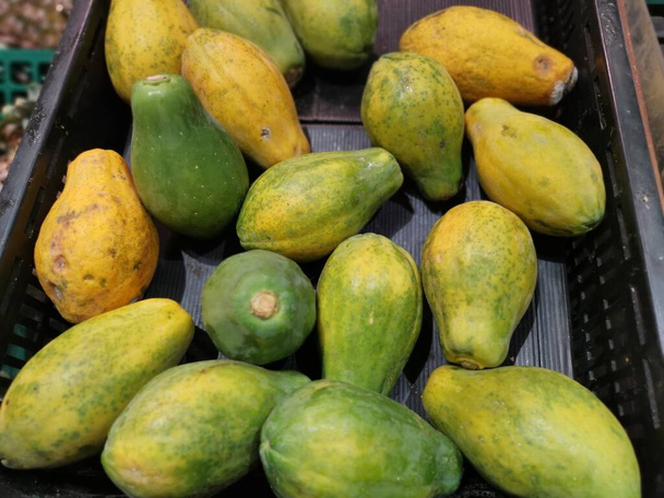 lots of dwarf papaya fruits. - Photo, Image