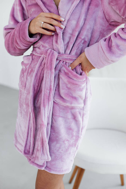 Young healthy serene woman girl relaxing in bathrobe and spa towel after having bath shower at home. Beauty treatment, rest and body care procedures. High quality photo - Zdjęcie, obraz